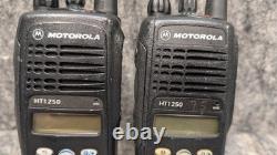 Lot of 2? Motorola HT1250 VHF Two-Way Radios AAH25KDF9AA5AN & Charging Base Lot of 2? Motorola HT1250 VHF Two-Way Radios AAH25KDF9AA5AN & Charging Base