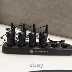 Motorola Black Portable/Four Handheld Two-Way Radios withMulti-Unit Charging Dock