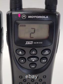 Motorola XTN Series two-way radios lot of 3 (Docking Station & 2 belt clips)